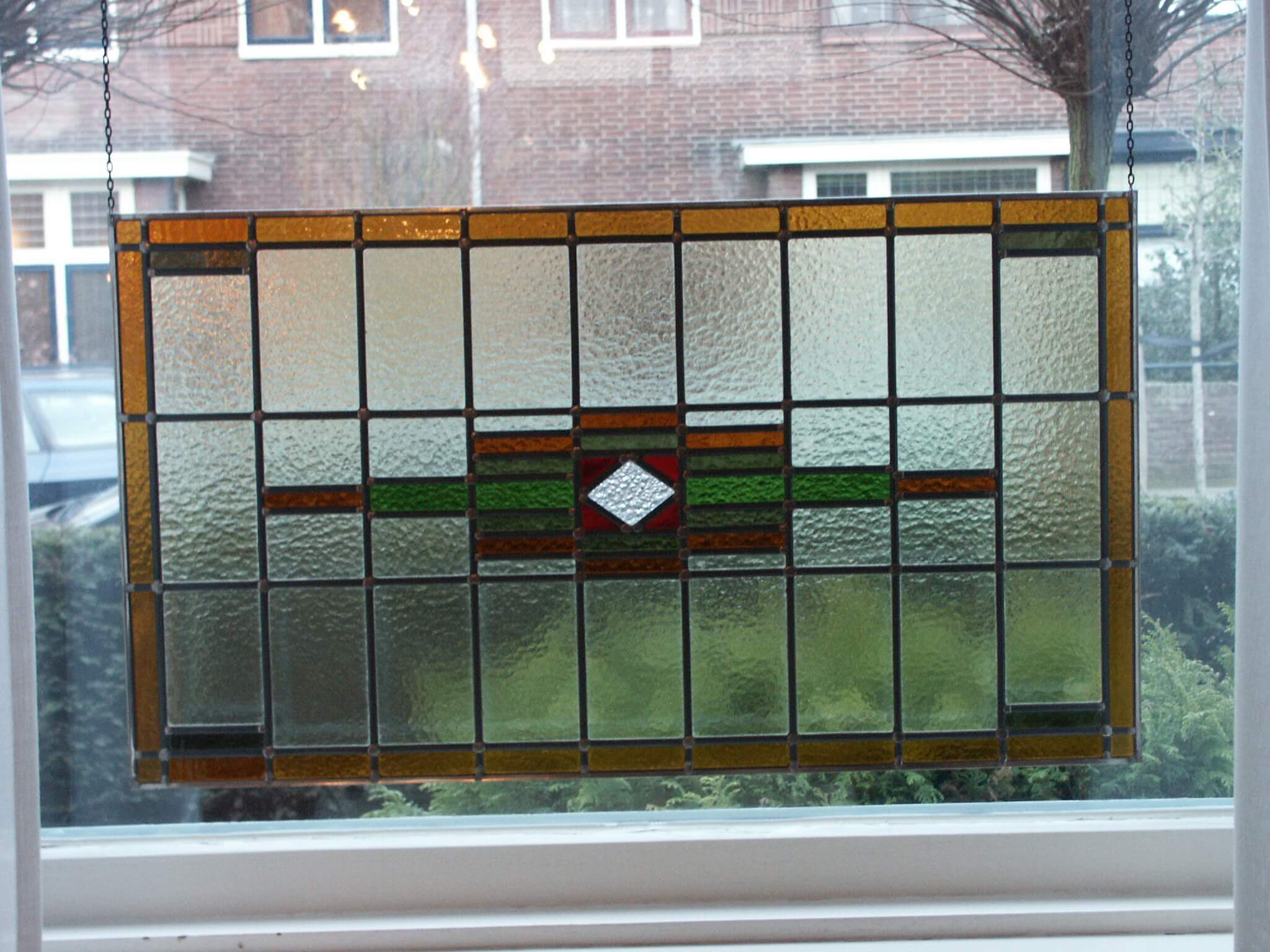 Glas in lood venster als raamhanger - Leenders glas in lood